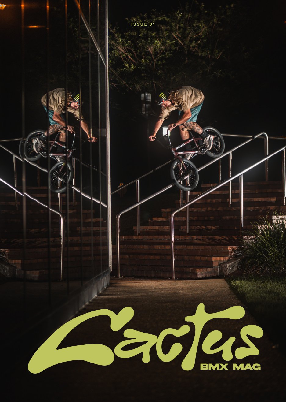 Issue 01 cover: Boyd Hilder, a tight smith on a handrail in Brisbane at night, mirrored in glass. Photo by Mitch Wood.